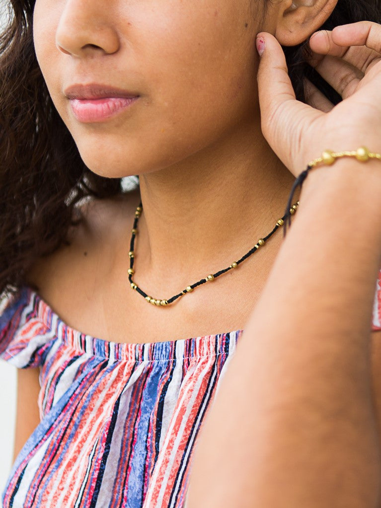Artillery black and gold choker necklace | Fair Anita