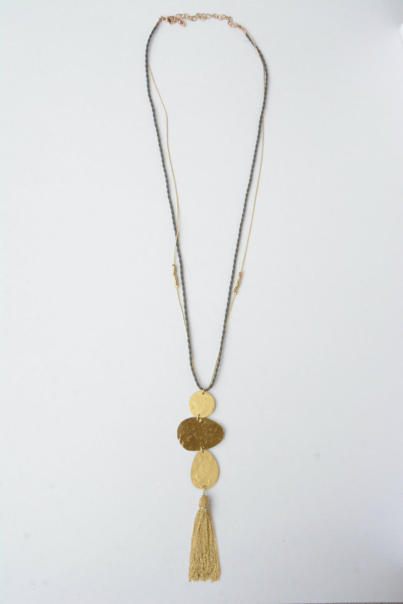 Fair trade necklace with three oblong circles hooked in a chain with a tassel. Fair Anita