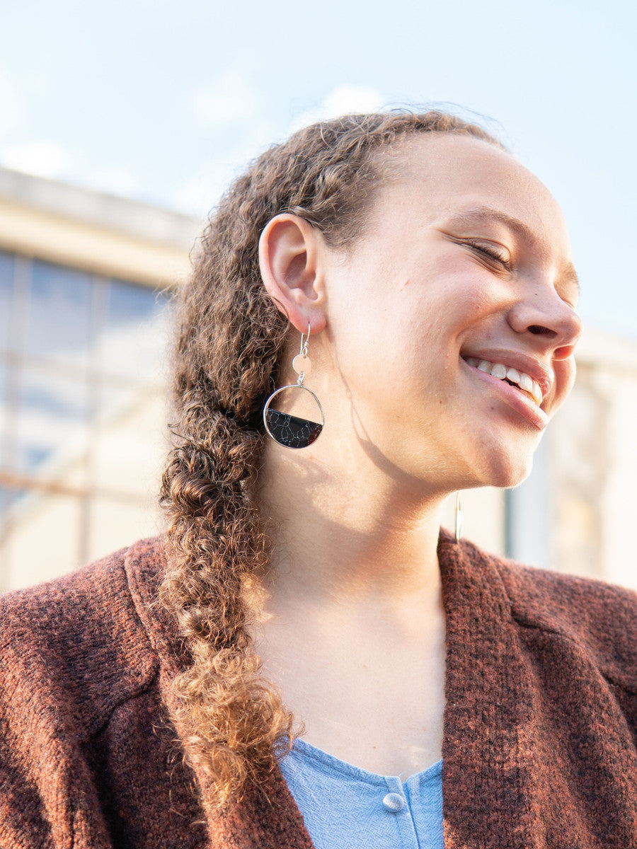 black and silver half disc earrings