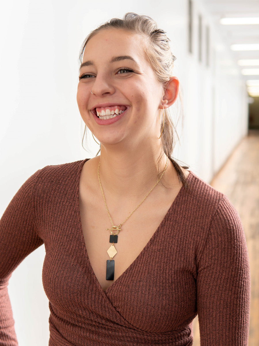 drop geometric black and brass necklace_Fair Anita