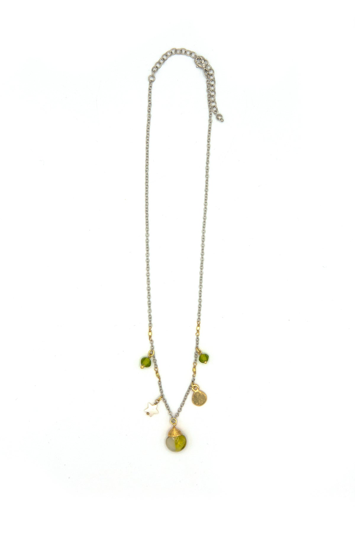 Fair trade mixed-metal charm necklace featuring olive green recycled glass beads, mother-of-pearl star charm, and textured gold disc on a silver-tone chain