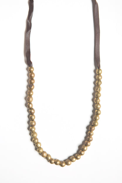 recycled leather and bullet casing necklace brass | Fair Anita